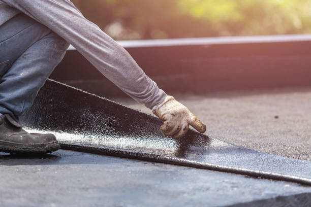 Professional Waterproofing technician working in Roseville, MI